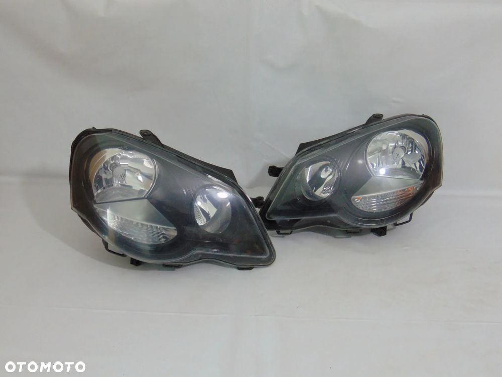 ORYGINAŁ lampa przednia przód lewa prawa czarna VW Volkswagen Polo 4 IV 9N FL lift 05-09r - 2