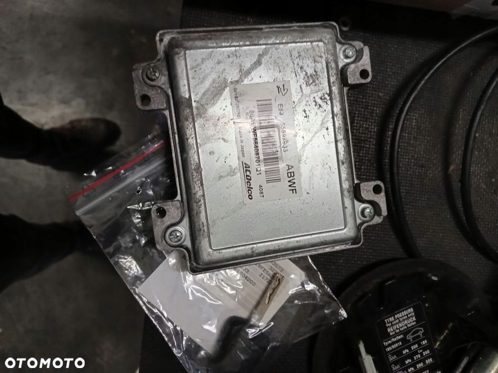 OPEL CORSA D 1.2 KOMPUTER ECUE83 55597933 ABWF PIN - 1