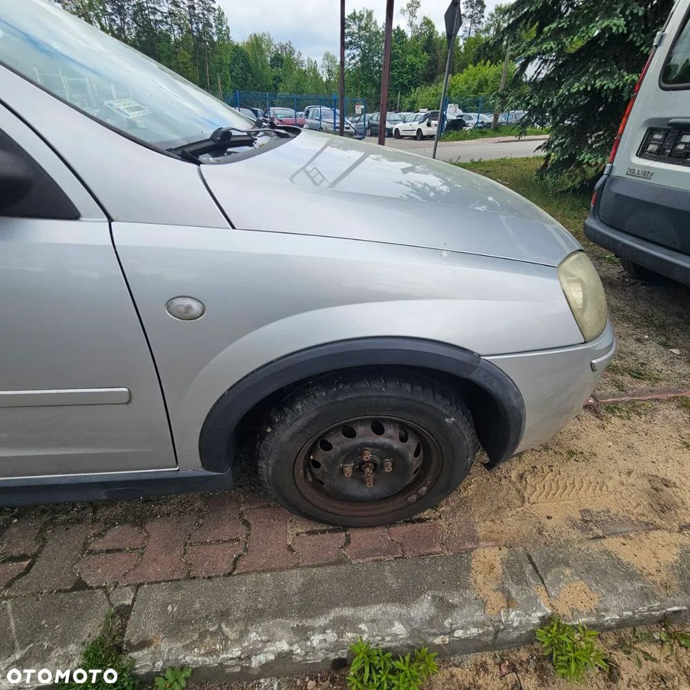 Błotnik / błotniki /prawy lewy przód / Opel Corsa C (kod lak Z157) - 1
