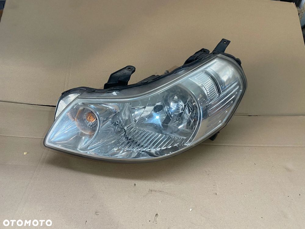 LAMPA LEWA PRZÓD PRZEDNIA SUZUKI SX4 SEDICI EUROPA - 1