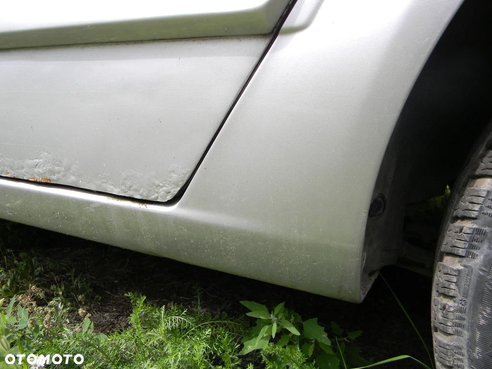 błotnik lewy prawy tył OPEL ASTRA III H SEDAN Z147 ćwiartka - 2