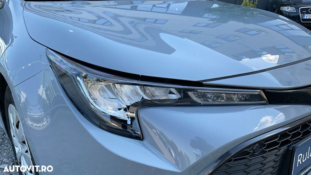 Toyota Corolla 1.8 HSD Business - 32