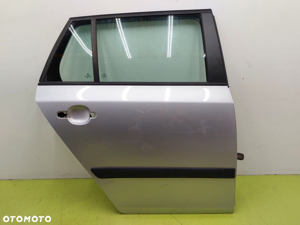 Drzwi tylne PRAWE tył SKODA FABIA II 2 LIFT 2010-2014 KOMBI LA7W SREBRNE - 1