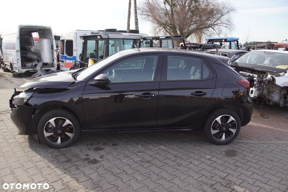 Auto na części - Opel Corsa-e F 100 kW KTV 2023R Falownik Inwerter Bateria Drzwi Klapa Błotnik Lusterko Zderzak Lampa Deska Kokpit Sterownik Moduł Czujnik Wyświetlacz Kierownica Panel - 7