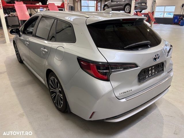 Toyota Corolla 1.8 HSD Business - 11