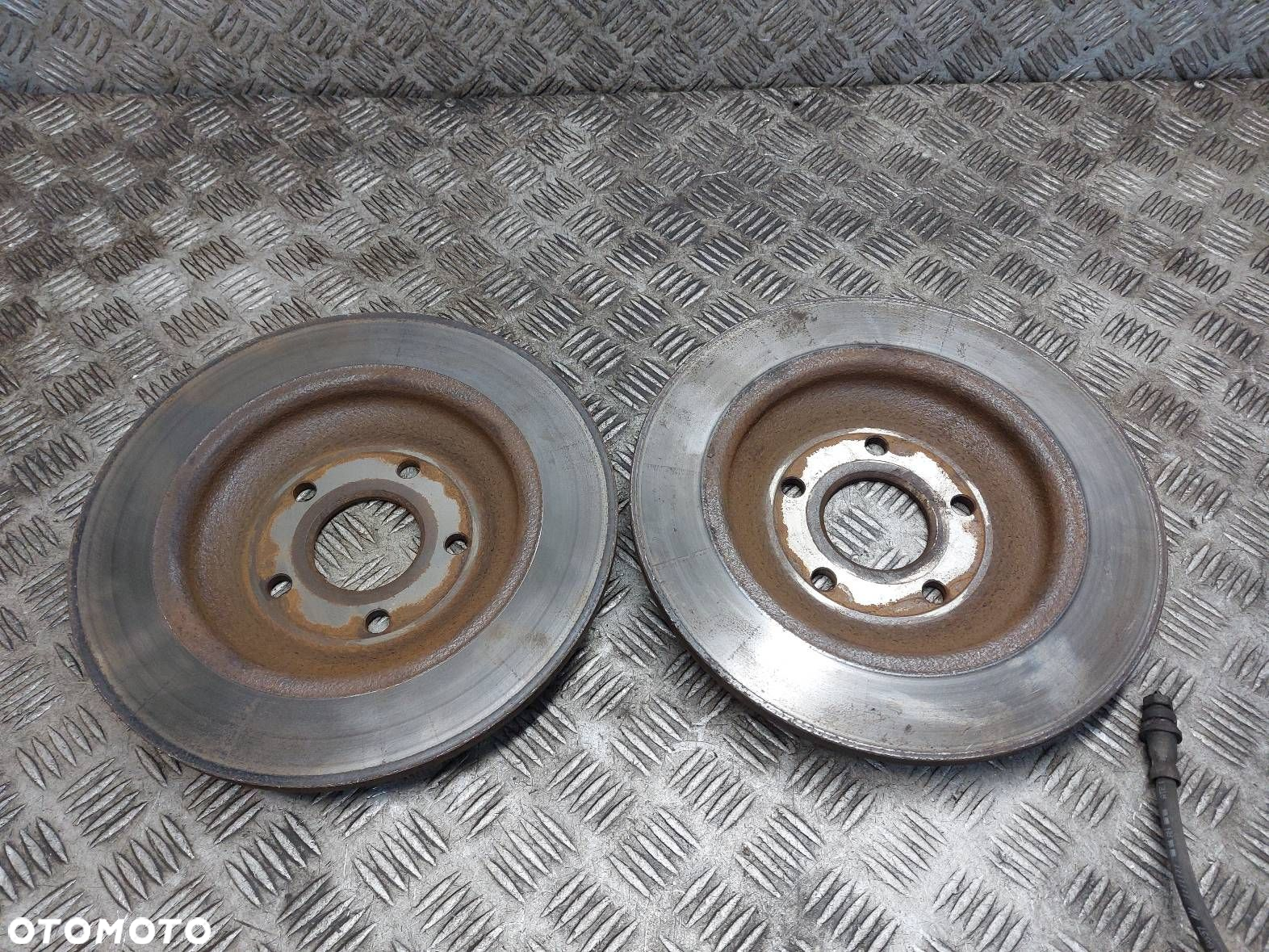 TARCZE HAMULCOWE TYŁ + KLOCKI + ZACISKI FORD FOCUS MK4 JX61-2D252-B - 9