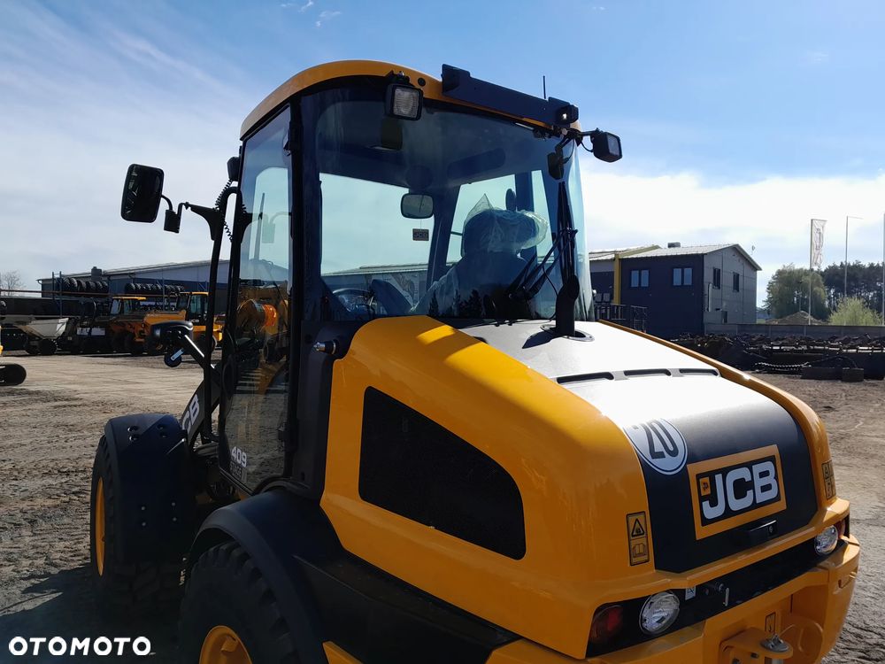 JCB 409 - 14