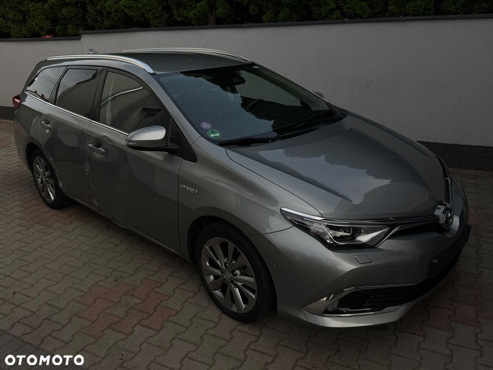 Toyota Auris 1.8 HSD Prestige NAVI - 1