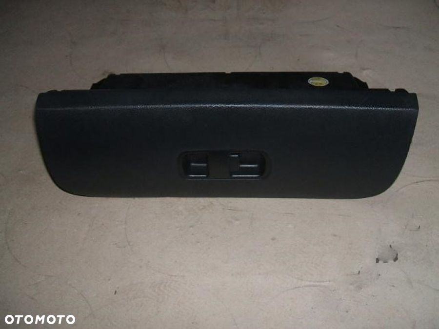 KIA CARNIVAL III 06- SCHOWEK PASAŻERA KLAPKA