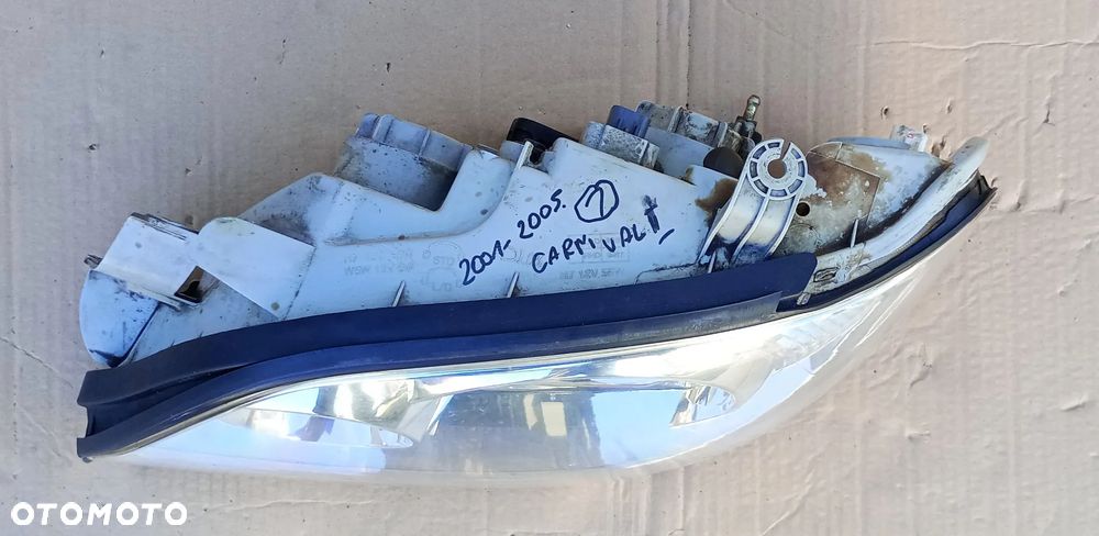 Reflektor lewy Lampa lewa Kia Carnival 2001- - 2