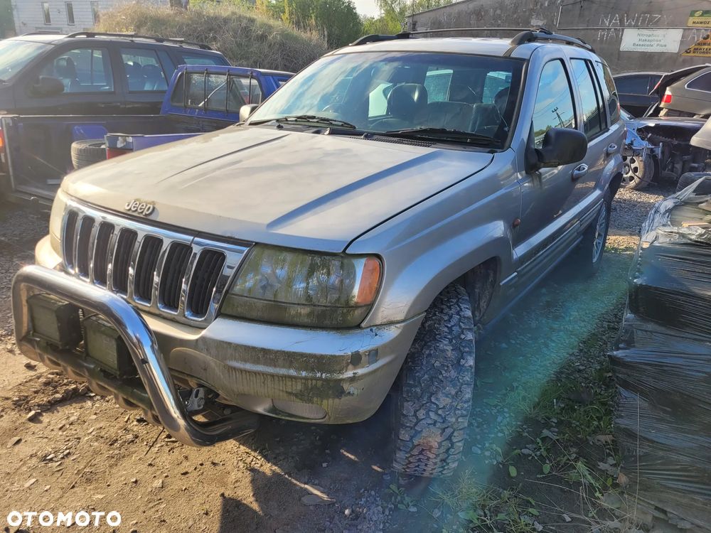 JEEP GRAND CHEROKEE WJ (ANGLIK) fotel fotele kanapa deska kokpit podsufitka boczek boczki klamka podłokietnik licznik - 1