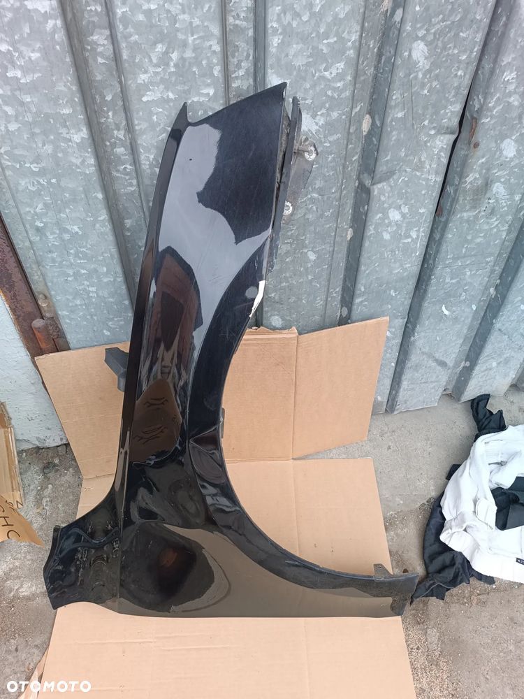 SKODA OCTAVIA III 2013R BŁOTNIK PRZEDNI PRAWY CZARNY LF9R 1Z17 - 1