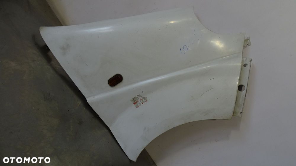 BŁOTNIK PRAWY PRZEDNI OPEL VIVARO - 1