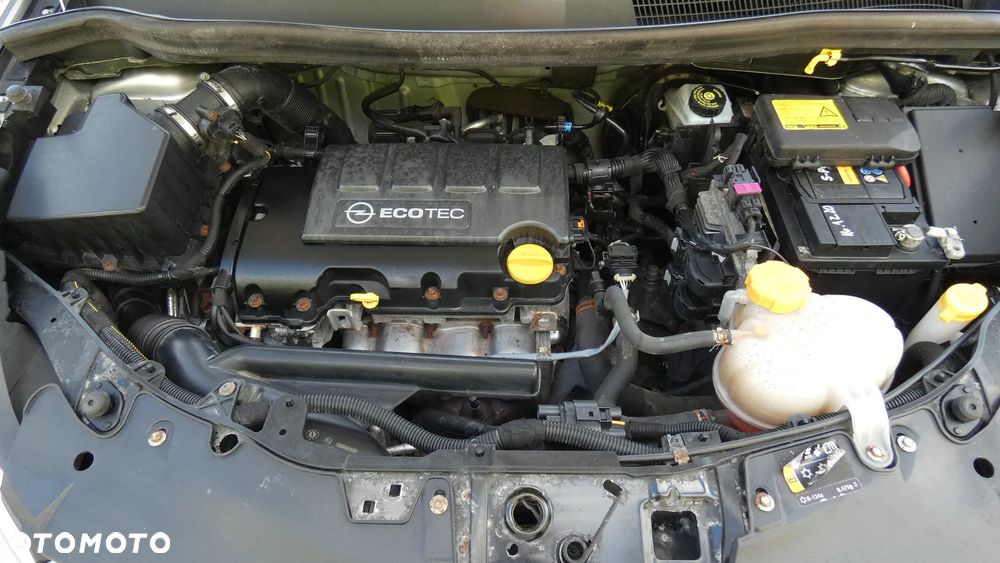Opel Corsa 1.2 16V Enjoy - 23