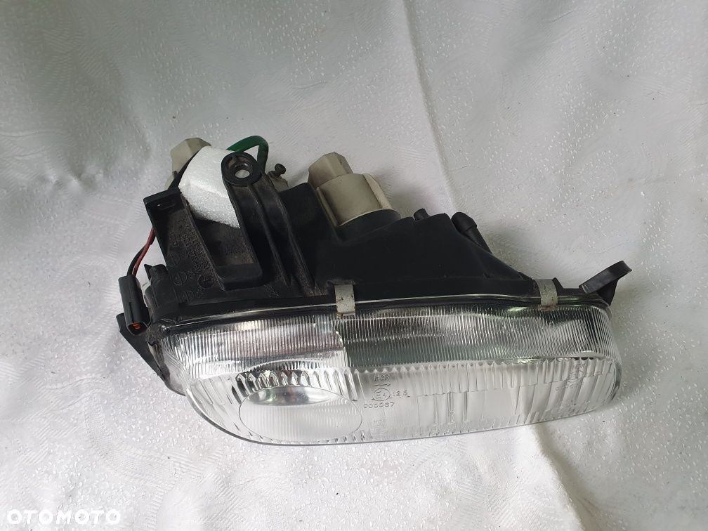 Lampa prawa mazda 323 Europa Soczewka - 3
