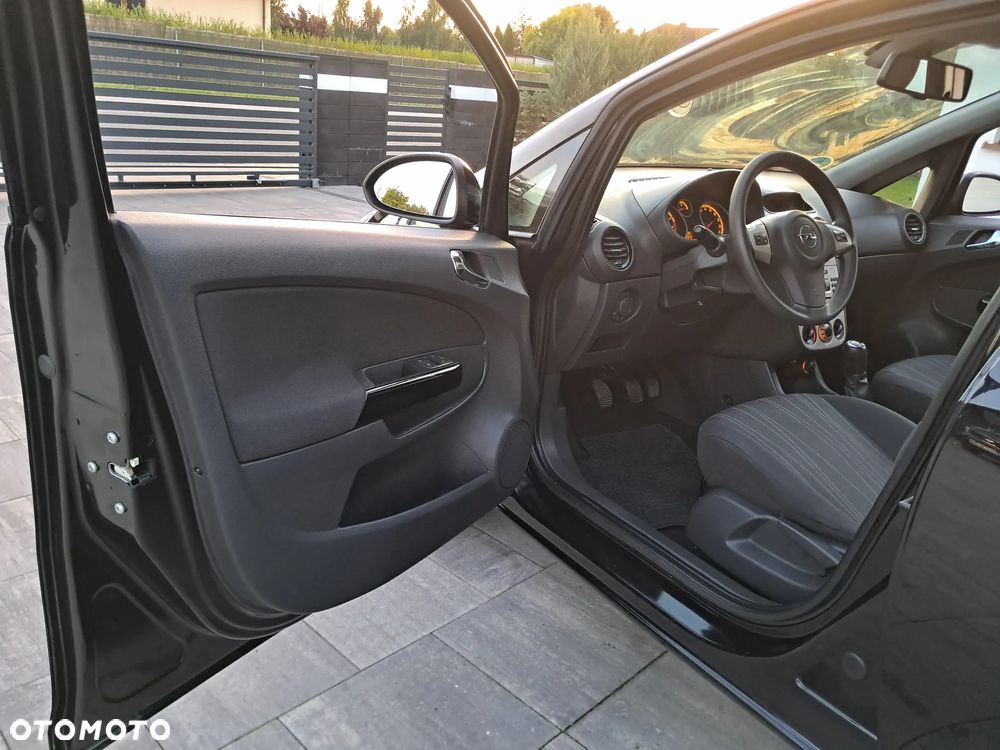 Opel Corsa 1.2 16V Enjoy - 18