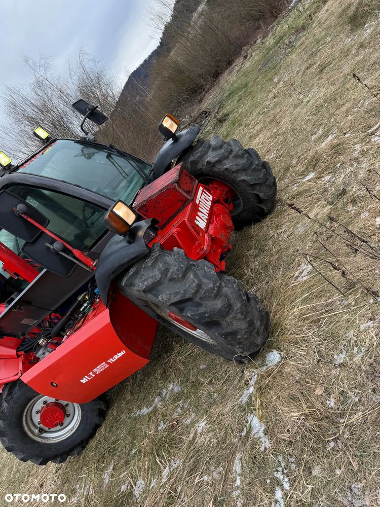 Manitou MLT523  Ładowarka teleskopowa 5m Wysięg 2,3 tony udzwig. Posuw wideł Hydrauliczny oraz rozsuwanie wideł hydr. Szybko-złącze hydrauliczne. 2x kamera PERKINS silnik TURBO  z Komuny Norweskiej! Jak Nowa 4287 mtg Zero luzów wycieków SERWISOWANA w  DEKRA.  Opony jak Nowe. Napęd 4x4 Hydrostatic REWERS - 14