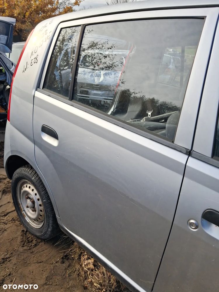 Daihatsu cuore 03 drzwi prawy tyl E28 - 3
