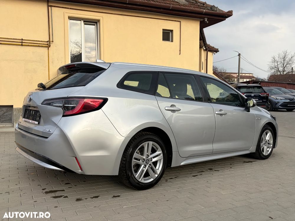 Toyota Corolla 1.8 HSD Business - 10