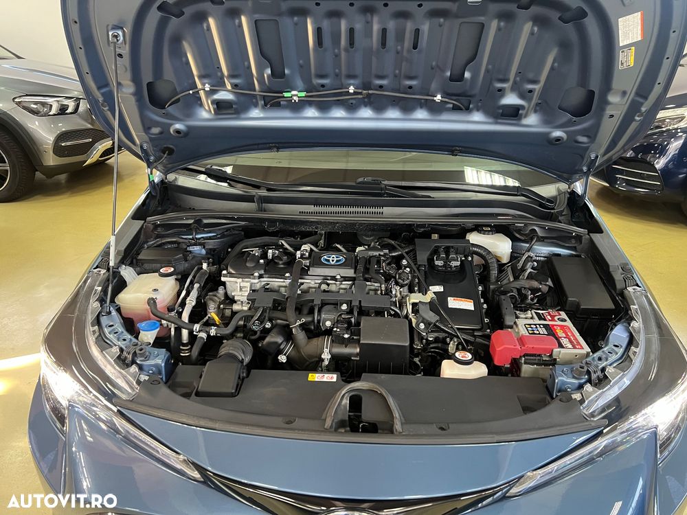 Toyota Corolla 1.8 HSD Business - 35
