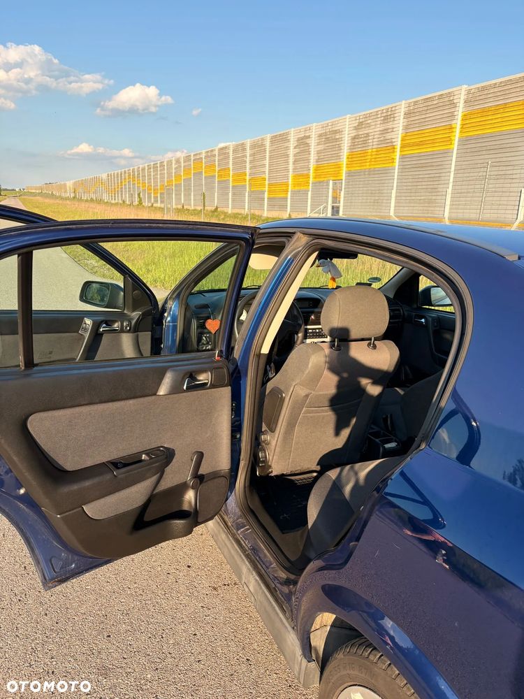 Opel Astra 1.8 Sport - 14