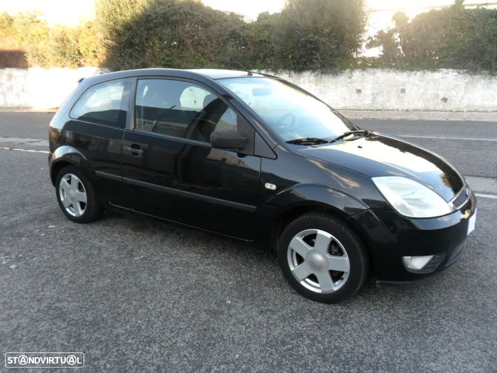 Ford Fiesta 1.4 TDCi Ghia - 13