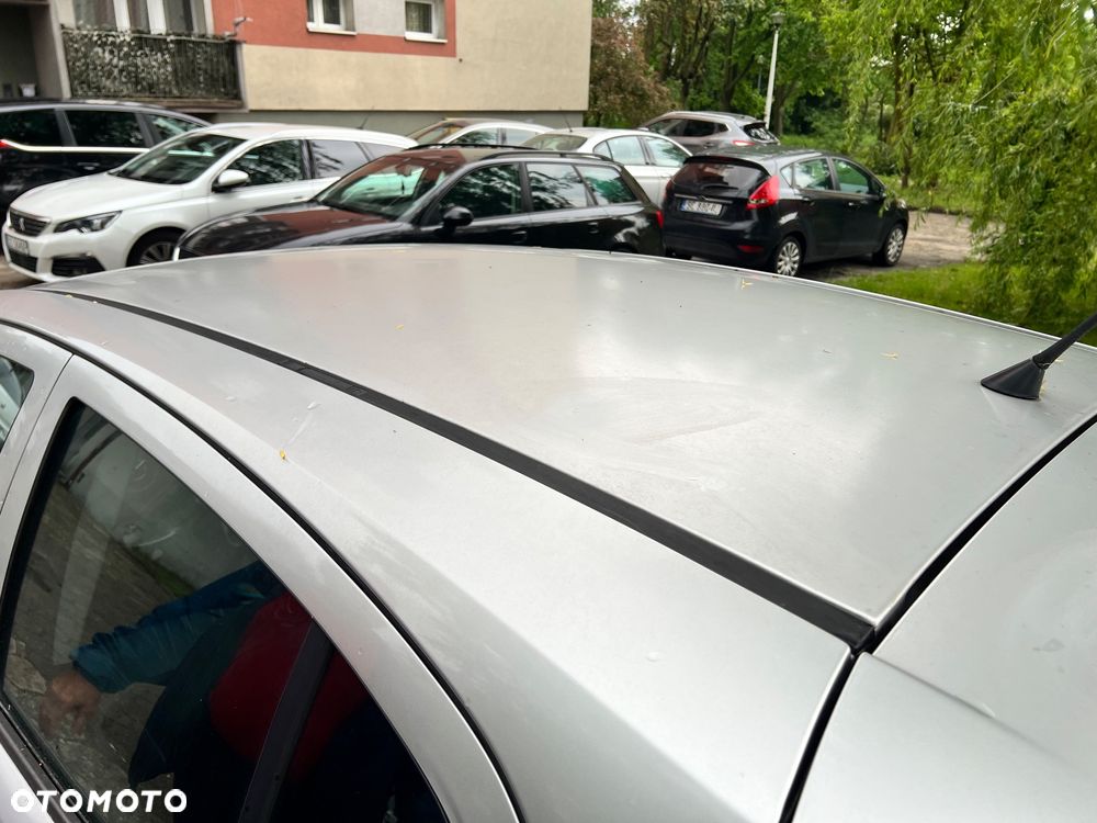 Opel Corsa 1.2 16V Cosmo - 3