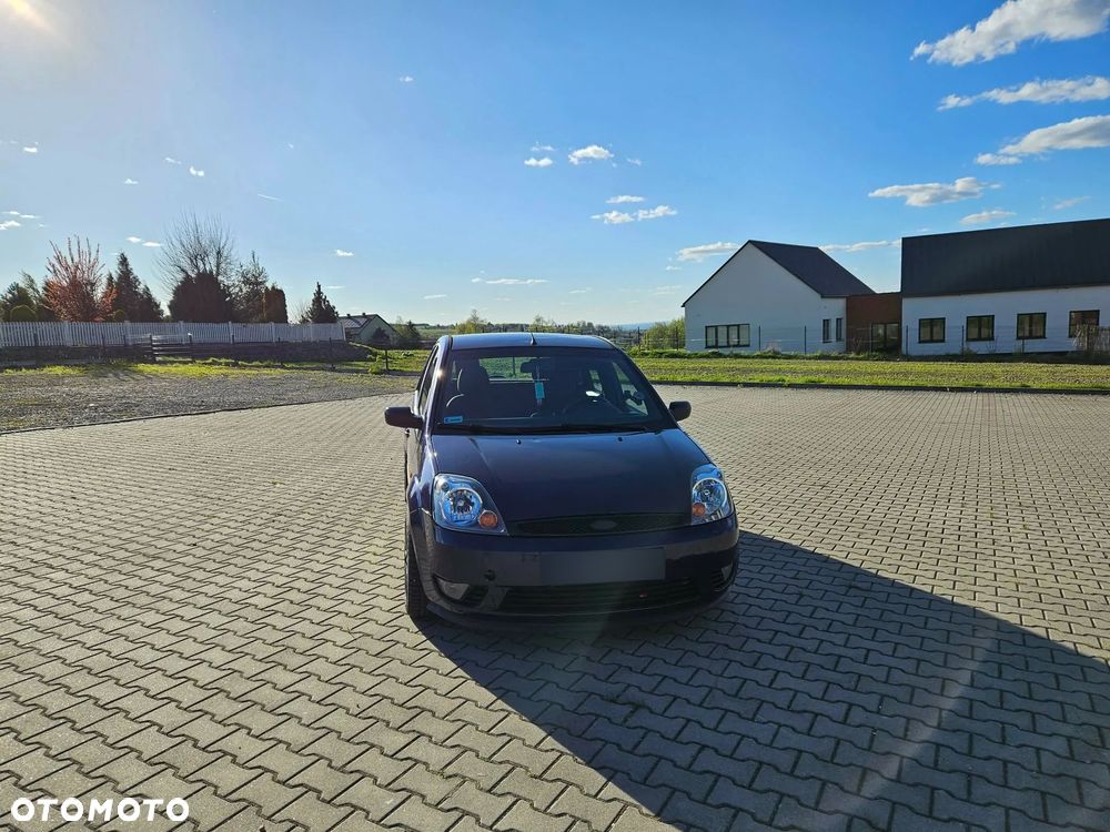Ford Fiesta 1.4 Ghia - 12
