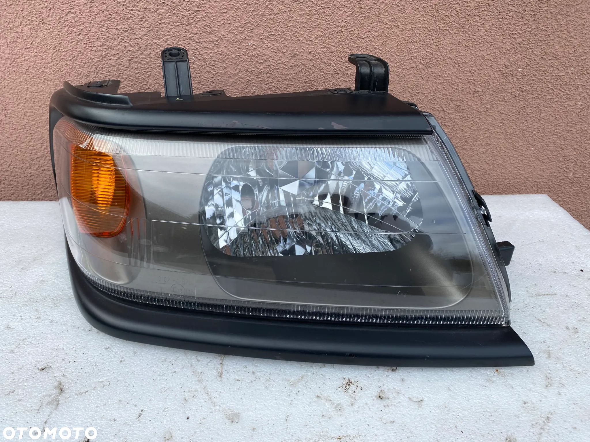 lampa pajero sport I koito prawa eu cała - 1