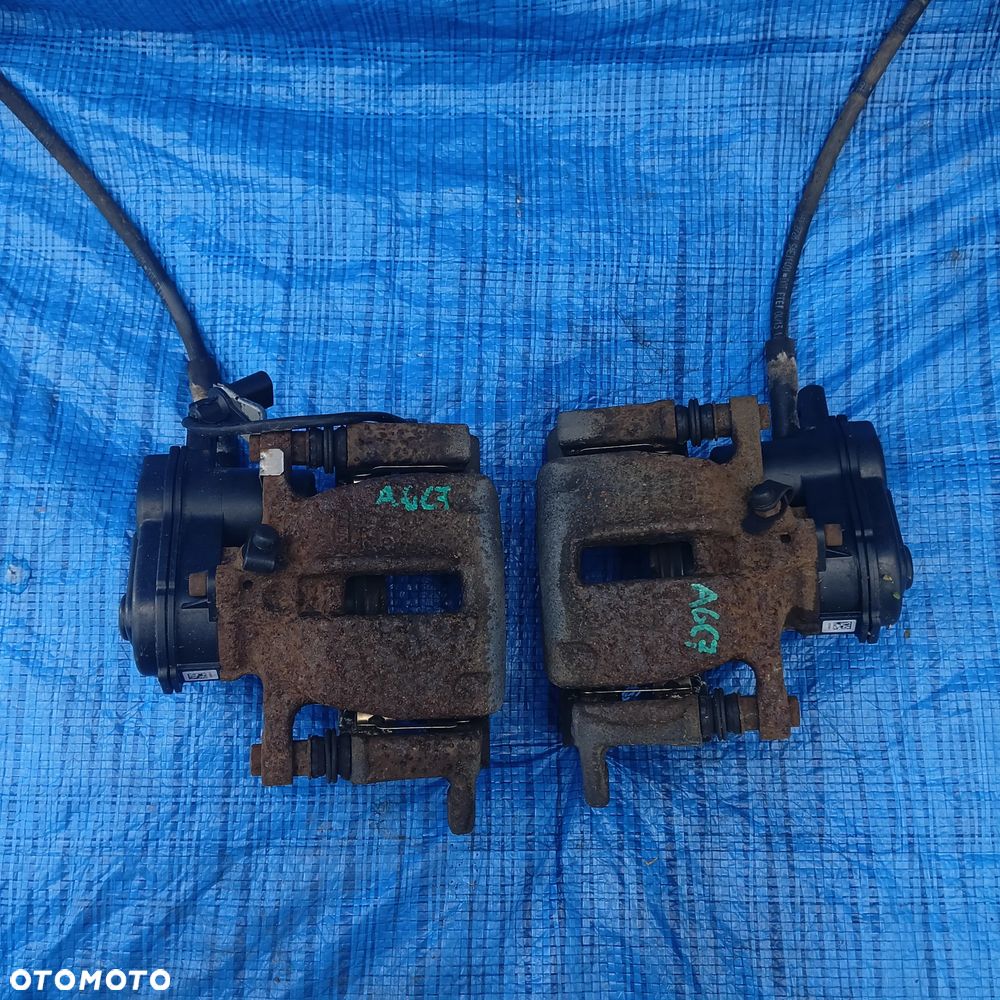 ZACISK HAMULCOWY Z SILNICZKIEM PRAWY LEWY TYŁ TYLNY AUDI A6 C7 A7 C7 ; 644GNO64 3.0L diesel - 1