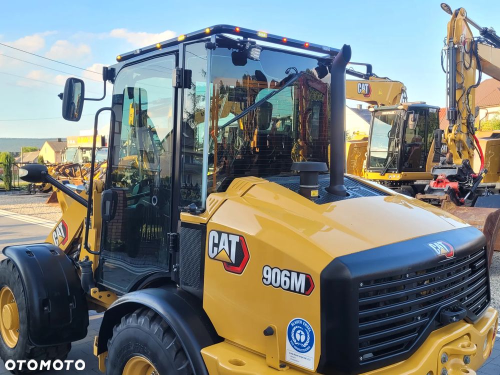 Caterpillar 906M / widły + łyżka otwierana / model 2022 r. / STAN IDEALNY / - 12