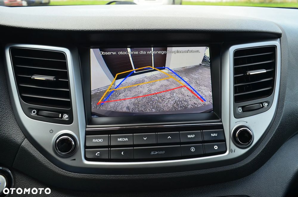 Hyundai Tucson blue 1.6 GDi 2WD Navi - 32