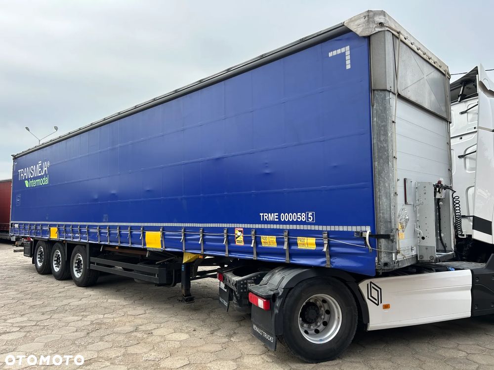 Schmitz Cargobull FIRANKA PODNOSZONY DACH NOWE PLANDEKI / 657 841 KM PRZEBIEGU / BARDZO ŁADNE OPONY / Z PEŁNYM WYPOSAŻENIEM DO ZAŁADUNKU / UCHWYTY PROMOWE / DOSTĘPNE 20 SZTUK KOLORY SREBRNY - NIEBIESKI - CZERWONY !! - 5