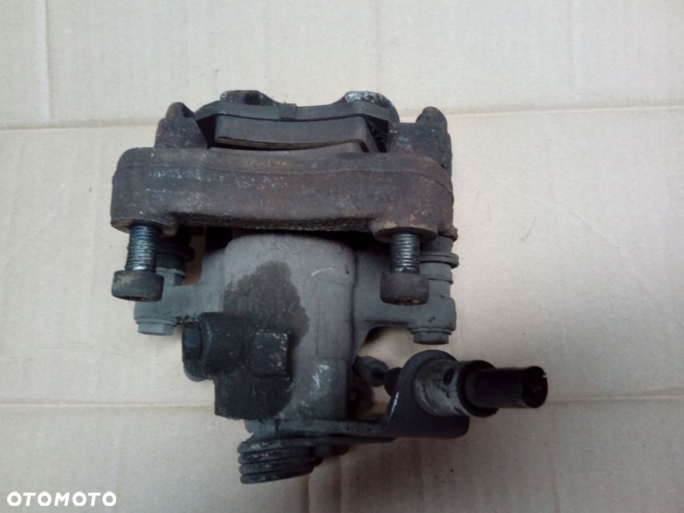 Citroen C4 I Peugeot 308 T7 zacisk hamulcowy tyl tylny  prawy lewy - 5
