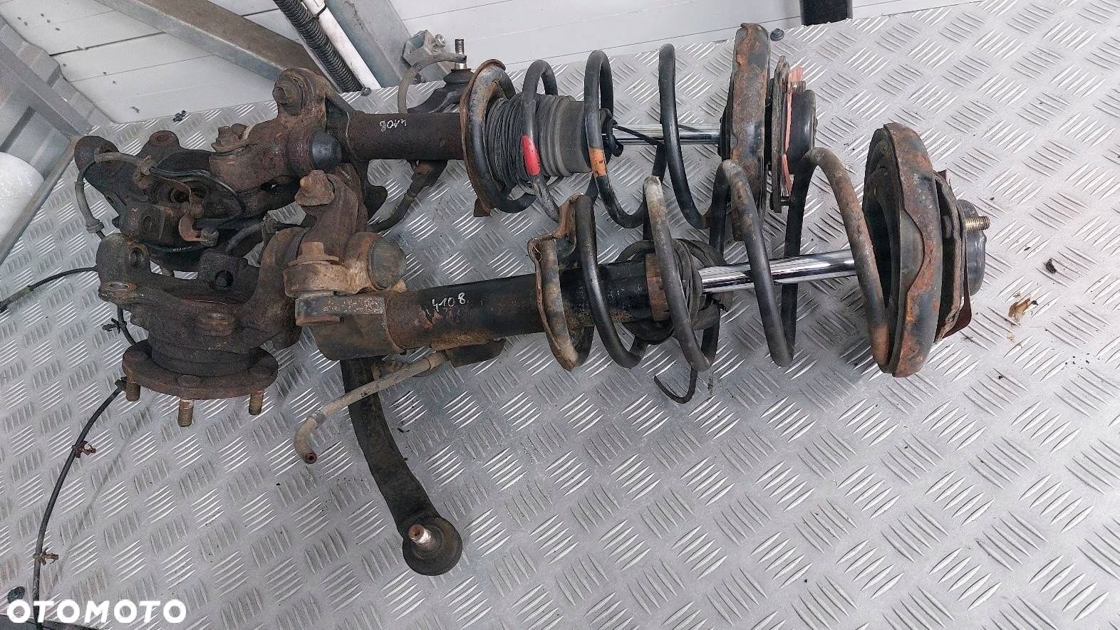 AMORTYZATOR SPRĘŻYNA ZWROTNICA LEWY  PRAWY PRZÓD NISSAN PRIMERA P12 - 1
