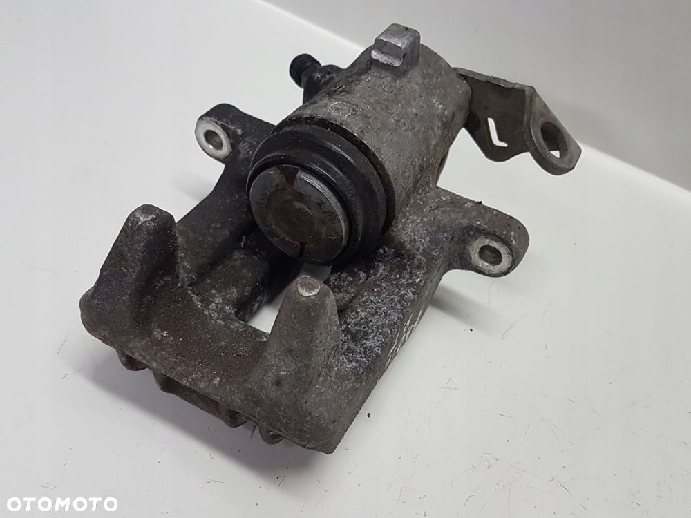 FABIA II 1.4 BENZ ZACISK PRAWY TYŁ TYLNY LUCAS - 1