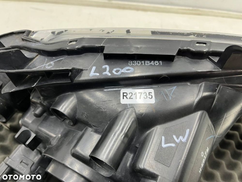 Lampa reflektor Mitsubishi L200 KA KB 05-10r. LEWA przednia H4 oryginalna lewy przód EU 8301b461 - 15