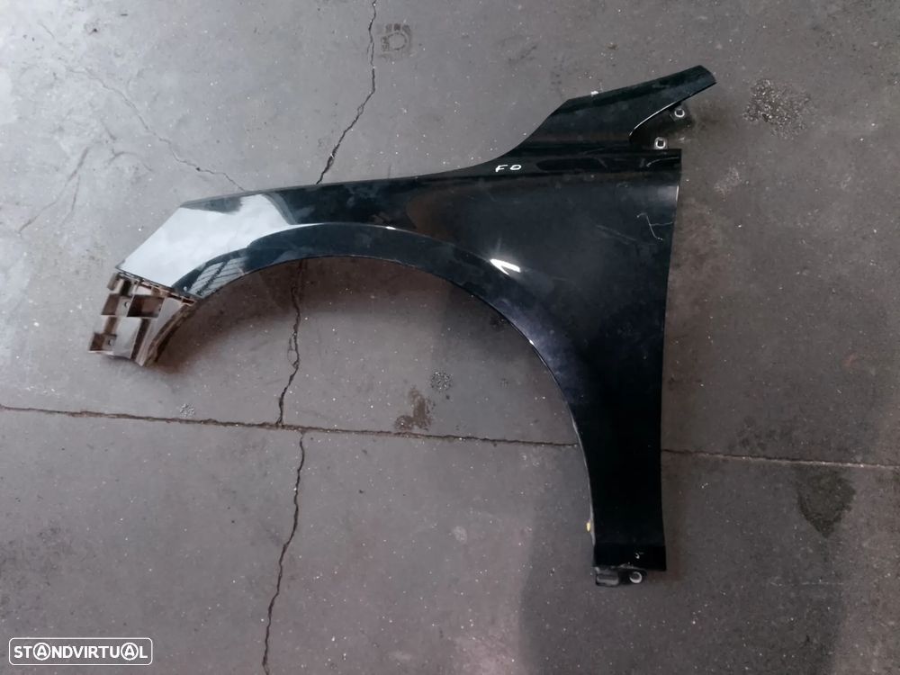 GUARDA LAMAS ESQUERDO VOLVO V40