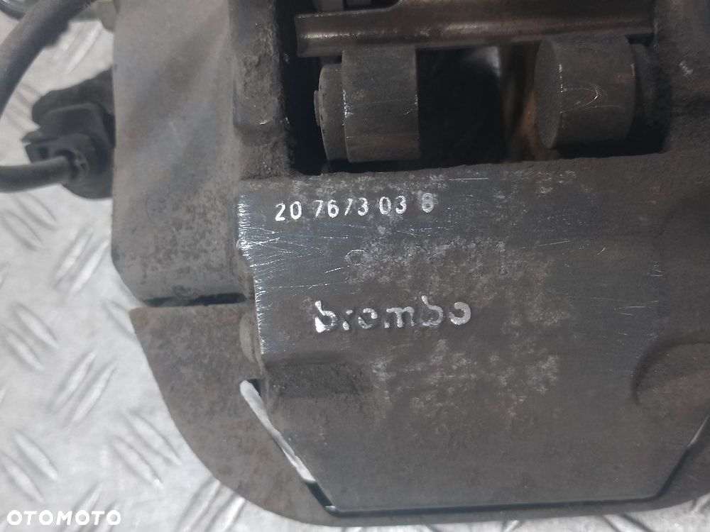 ZACISK HAMULCOWY LEWY TYŁ AUDI Q7 207673038 3.0 TDI - 5