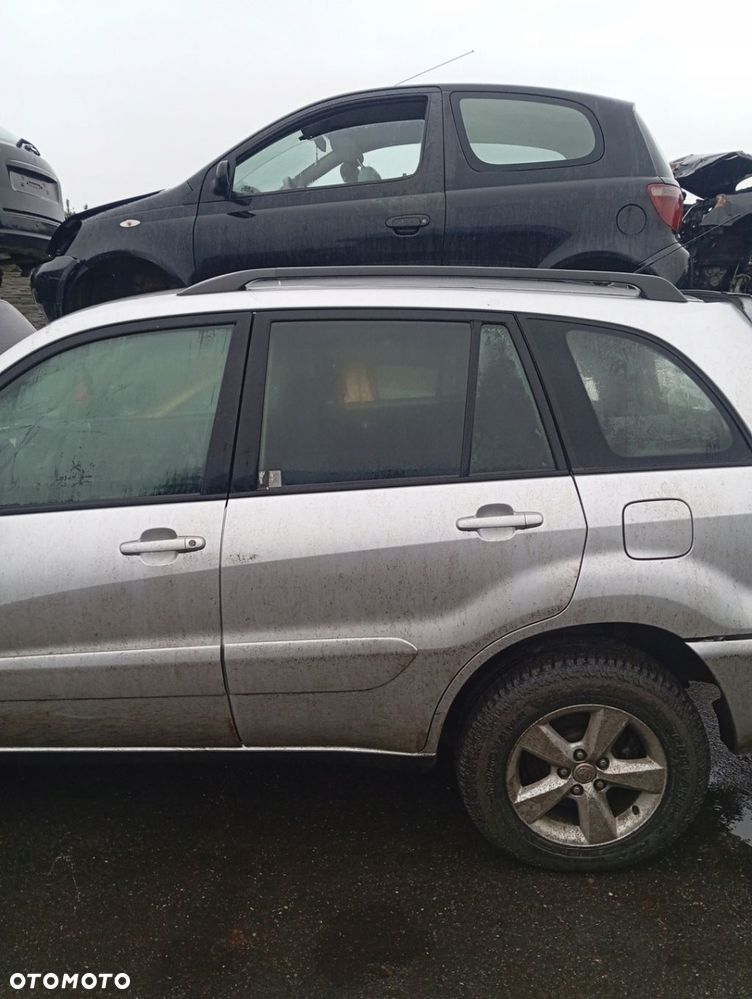 TOYOTA RAV4 II 5D LIFT DRZWI LEWE TYLNE TYŁ GOŁE 1D4 - 1