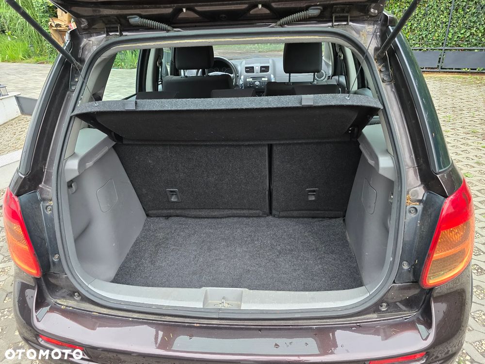 Suzuki SX4 1.6 Comfort Plus - 14