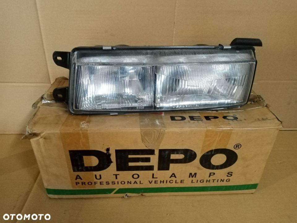 Lampa lewa przednia przód reflektor Mitsubishi Lancer 88r 00853691 - 1