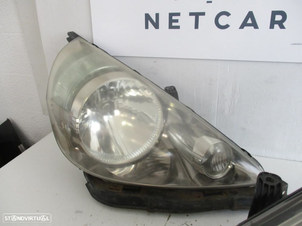 farol optica Honda Jazz 2004 - 3