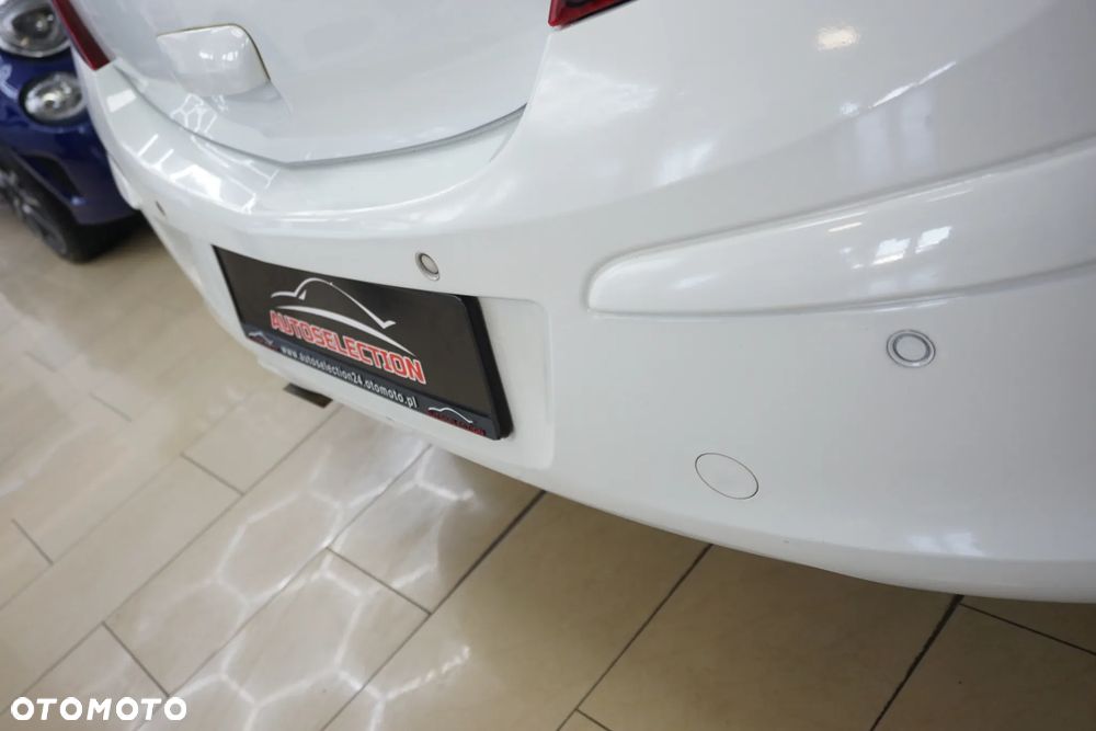 Opel Corsa 1.2 16V Cosmo - 17