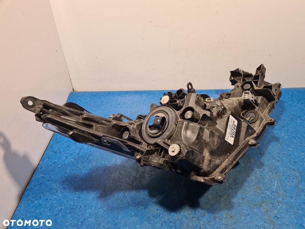 TOYOTA COROLLA E21 REFLEKTOR LEWY 81150-02T30-00 - 11