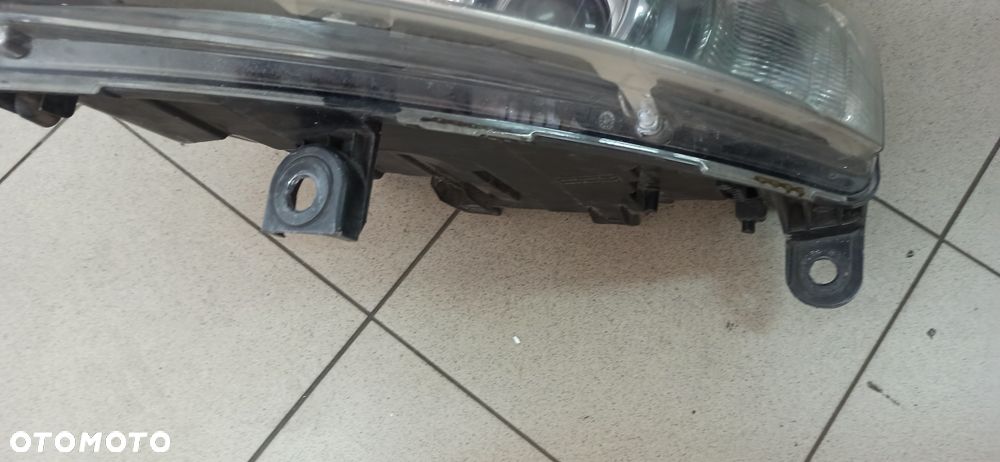 Audi A6 C6 Reflektor lampa przednia lewa 4F0941003AK XENON - 5