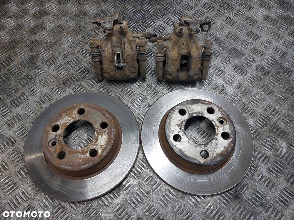 TARCZE HAMULCOWE TYŁ + KLOCKI + ZACISKI FORD GALAXY MK1 SHARAN ALHAMBRA - 1