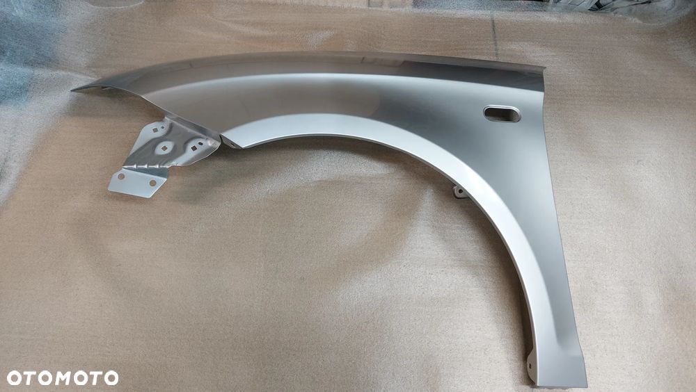 SEAT ALTEA 04-09 rok błotnik przedni lewy lub prawy LS7N cynk