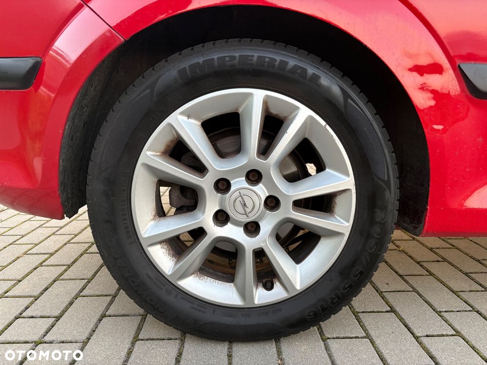 Opel Astra 1.8 Sport - 11