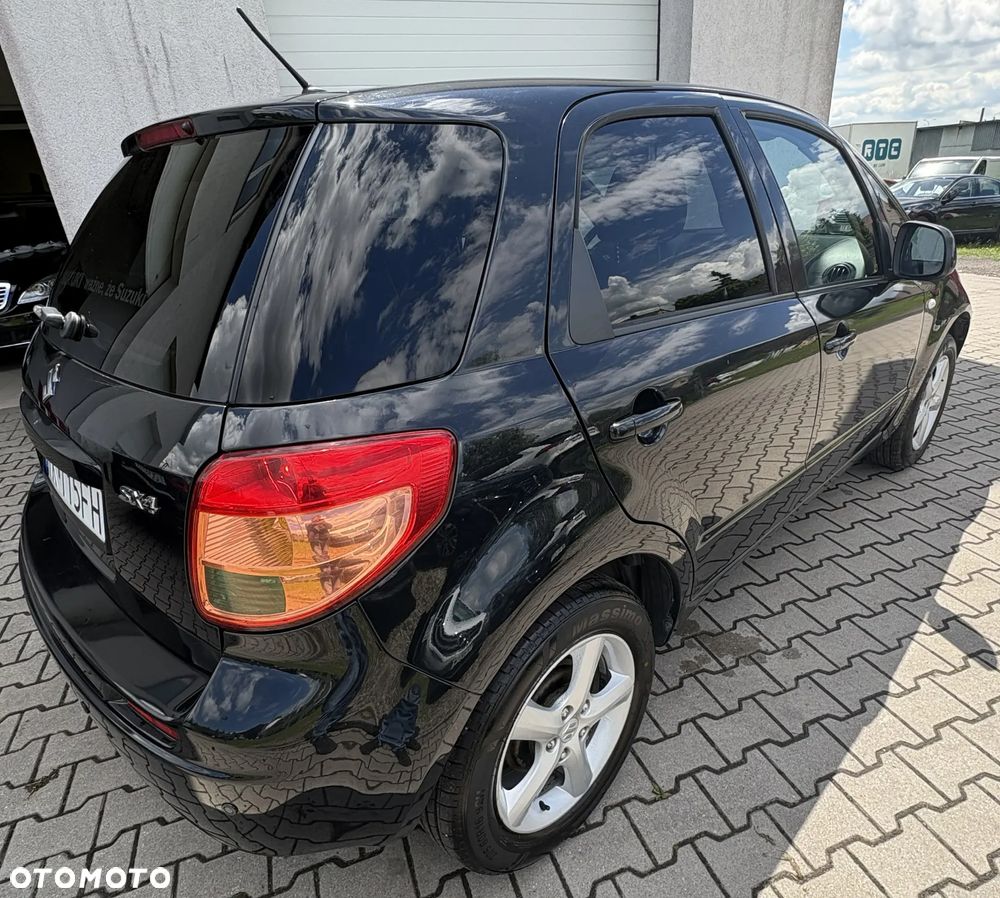 Suzuki SX4 1.6 GLX / Comfort - 4
